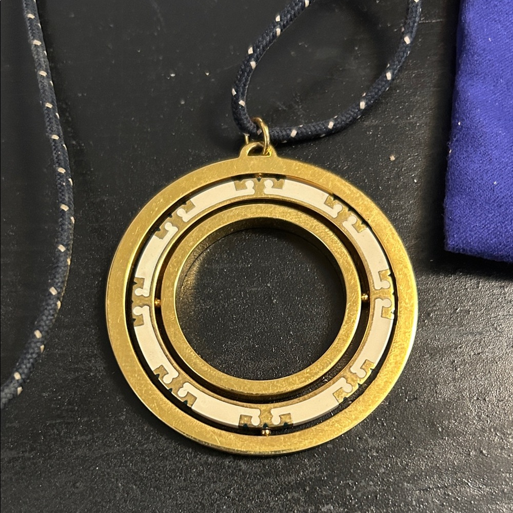 Tory Burch Navy and Gold Spinner Pendant Necklace, 24” - Picture 2 of 7
